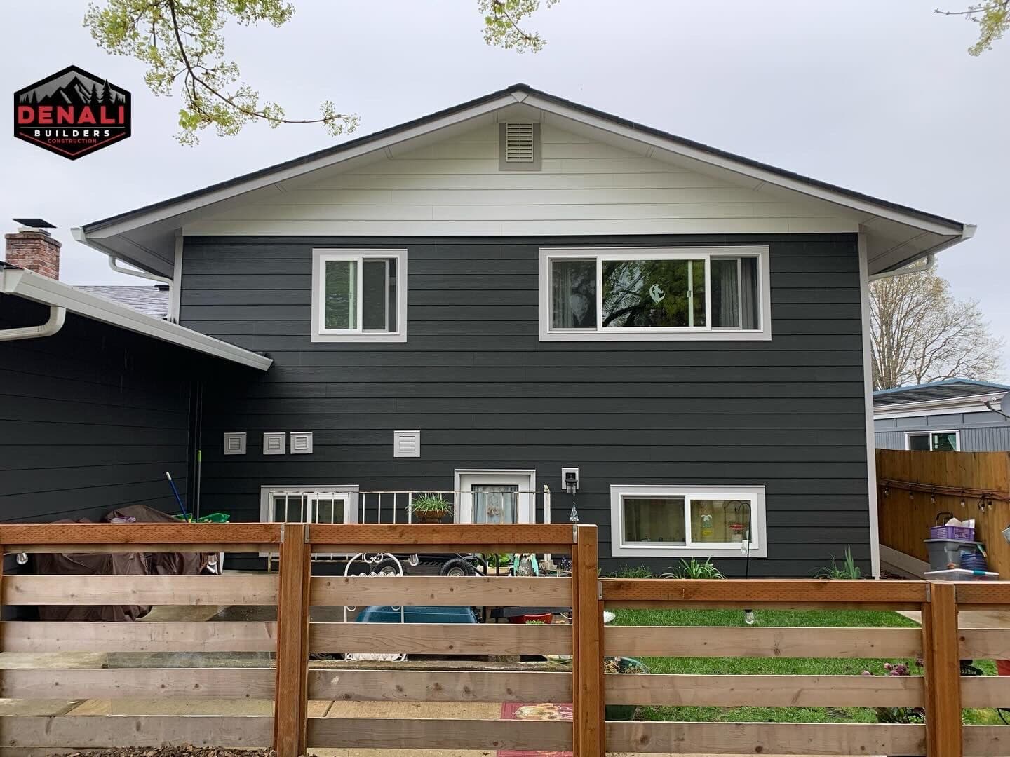 Two-tone gable siding with new trim and windows in Oregon home